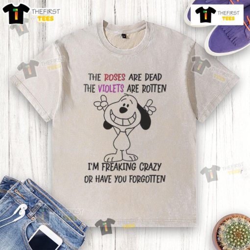 Funny Snoopy t-shirt with the quote 'I'm talking in English and you're listening in stupidity' on a casual design.