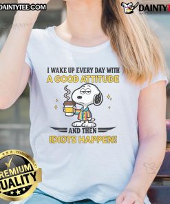Alt Text: Funny Snoopy T-shirt featuring 'I wake up every day with a good attitude and then idiots happen' design.