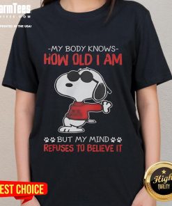 Funny Snoopy tee featuring 'My body knows how old I am, but my mind refuses' - perfect for humor-loving ladies.