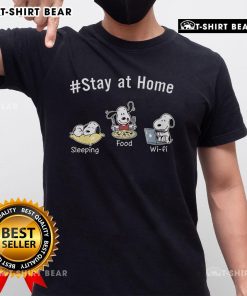 Alt Text: Funny Snoopy Stay At Home Sleeping Food Wi-Fi Peanuts T-Shirt featuring Snoopy lounging with snacks and Wi-Fi symbols.