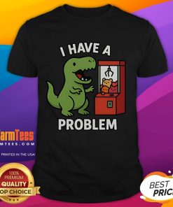 Alt Text: Funny T-Rex graphic on a gamer T-shirt, featuring I Have A Problem text for arcade claw machine enthusiasts.
