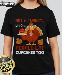 Funny Thanksgiving turkey cupcake design on a ladies tee, perfect for Thanksgiving celebrations and cupcake lovers.