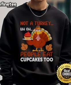 Alt Text: Funny Thanksgiving turkey cupcake sweatshirt, perfect for those who love cupcakes and humor during the holiday season.