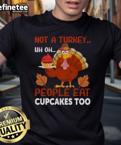 Funny Thanksgiving Turkey Cupcake T-Shirt featuring a whimsical cupcake design, perfect for holiday celebrations.