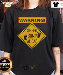 Funny warning sign for a speed bump ahead on a ladies tee, perfect for adding humor to casual outfits.