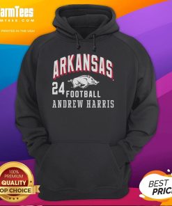Good Andrew Harris wearing an Arkansas Razorbacks hoodie, showcasing team spirit and style in a vibrant outdoor setting.