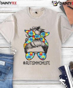 Autism mom with messy bun, sunglasses, and bandana, wearing a washed t-shirt for Mother's Day celebration.