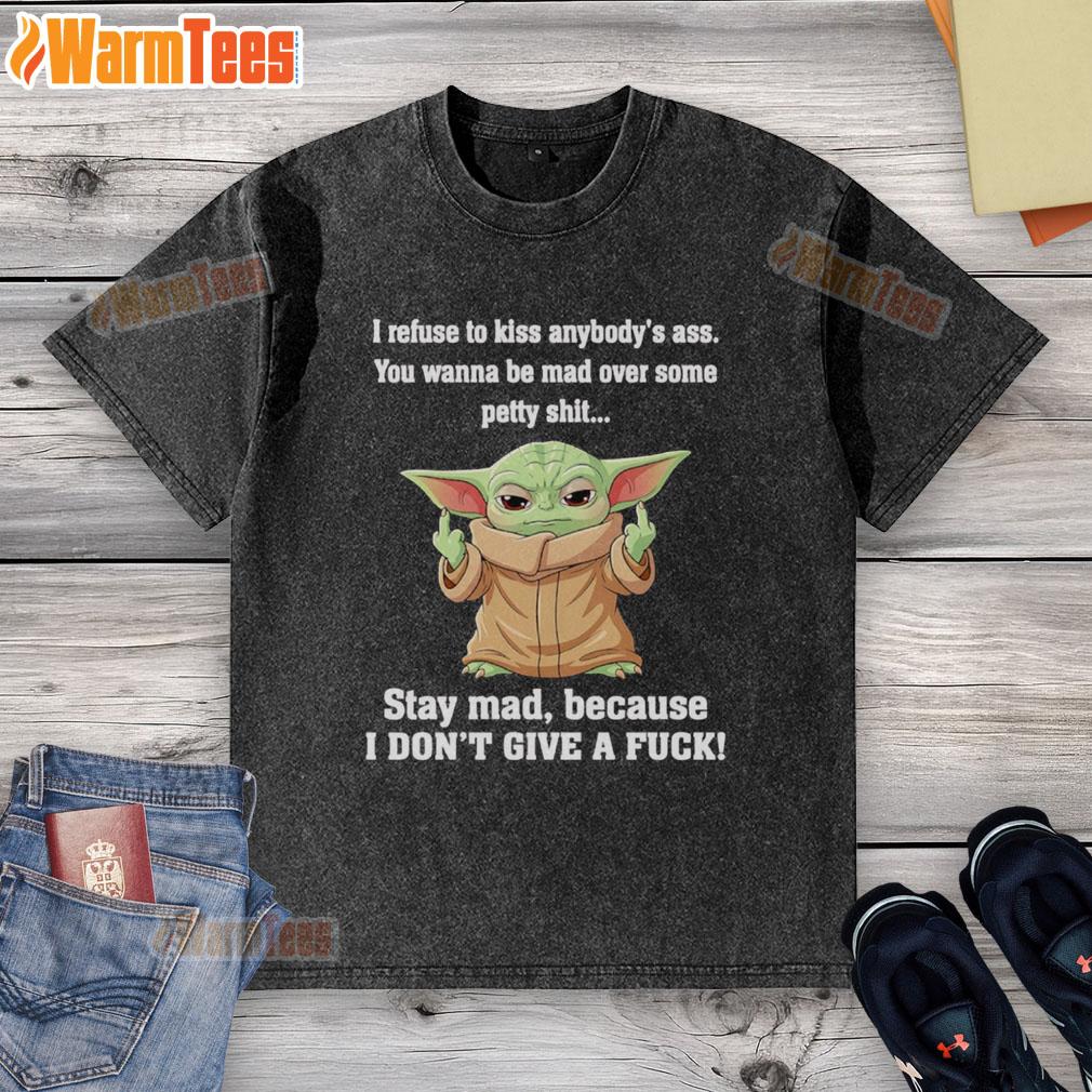 Good Baby Yoda Middle Finger I Refuse To Kiss Anybody's Ass You Wanna Be Mad Over Some Petty Shit Washed T-Shirt Good Baby Yoda graphic tee featuring a middle finger and a humorous quote about refusing to conform to petty demands.