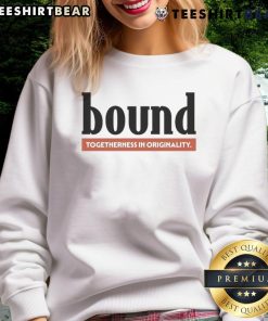 Good Bound Red Label Sweatshirt displayed on a hanger, showcasing its vibrant color and stylish design.
