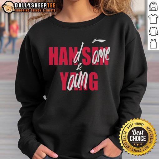 Handsome young man wearing a Good Casey Holdahl sweatshirt, showcasing a stylish casual look.