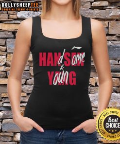 Young and handsome Casey Holdahl wearing a stylish tank top, showcasing a confident and relaxed summer look.