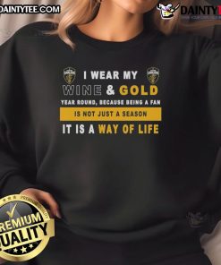Alt Text: Cleveland Cavaliers sweatshirt with 'I Wear My Wine And Gold Year Round' slogan, perfect for dedicated fans.
