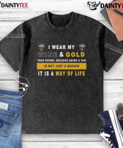Alt Text: Washed t-shirt featuring 'I Wear My Wine and Gold Year Round' for Cleveland Cavaliers fans, showcasing team spirit.