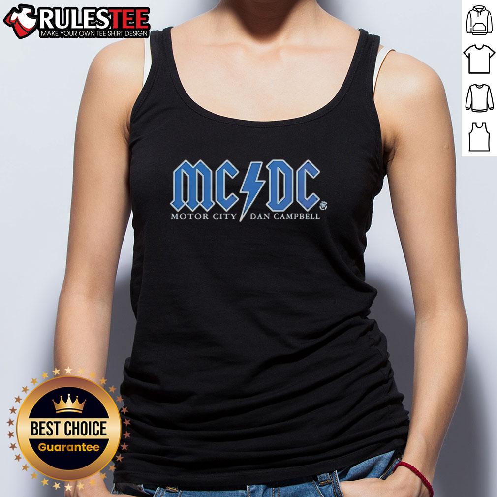 Good Detroit Lions Football Motor City Dan Campbell Tank Top Dan Campbell wearing a Detroit Lions tank top, showcasing Motor City pride and football spirit in vibrant colors.