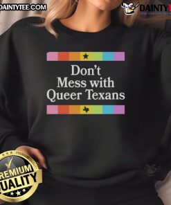 Alt Text: Good Don't Mess With Queer Texans sweatshirt featuring bold text in vibrant colors on a cozy fabric.