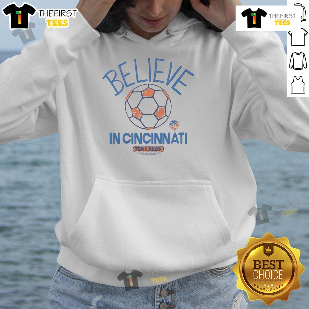 Good Fc Cincinnati Homage Mls X Ted Lasso Believe Hoodie Good FC Cincinnati Homage MLS x Ted Lasso Believe hoodie featuring vibrant colors and a stylish design for fans.