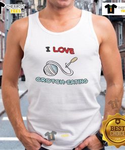 Model wearing a 'Good I Love Crotch Eating' tank top, showcasing a playful and bold graphic design for casual fashion.