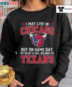 Chicago fan wearing a Houston Texans sweatshirt on game day, showcasing team pride and loyalty.