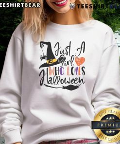 Good Just A Girl Who Loves Halloween sweatshirt featuring spooky graphics and a cozy design perfect for Halloween enthusiasts.