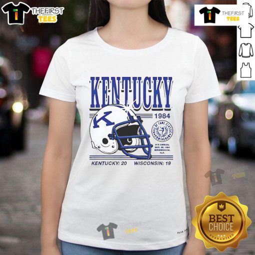 Alt Text: Vintage Kentucky Wildcats helmet from the 1984 game, showcasing Kentucky's 20-19 win over Wisconsin on a ladies' tee.