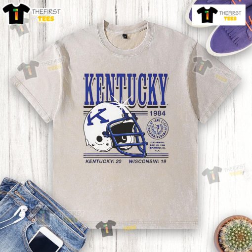 1984 Kentucky Wildcats helmet graphic on a washed t-shirt, celebrating the Kentucky 20, Wisconsin 19 football game.
