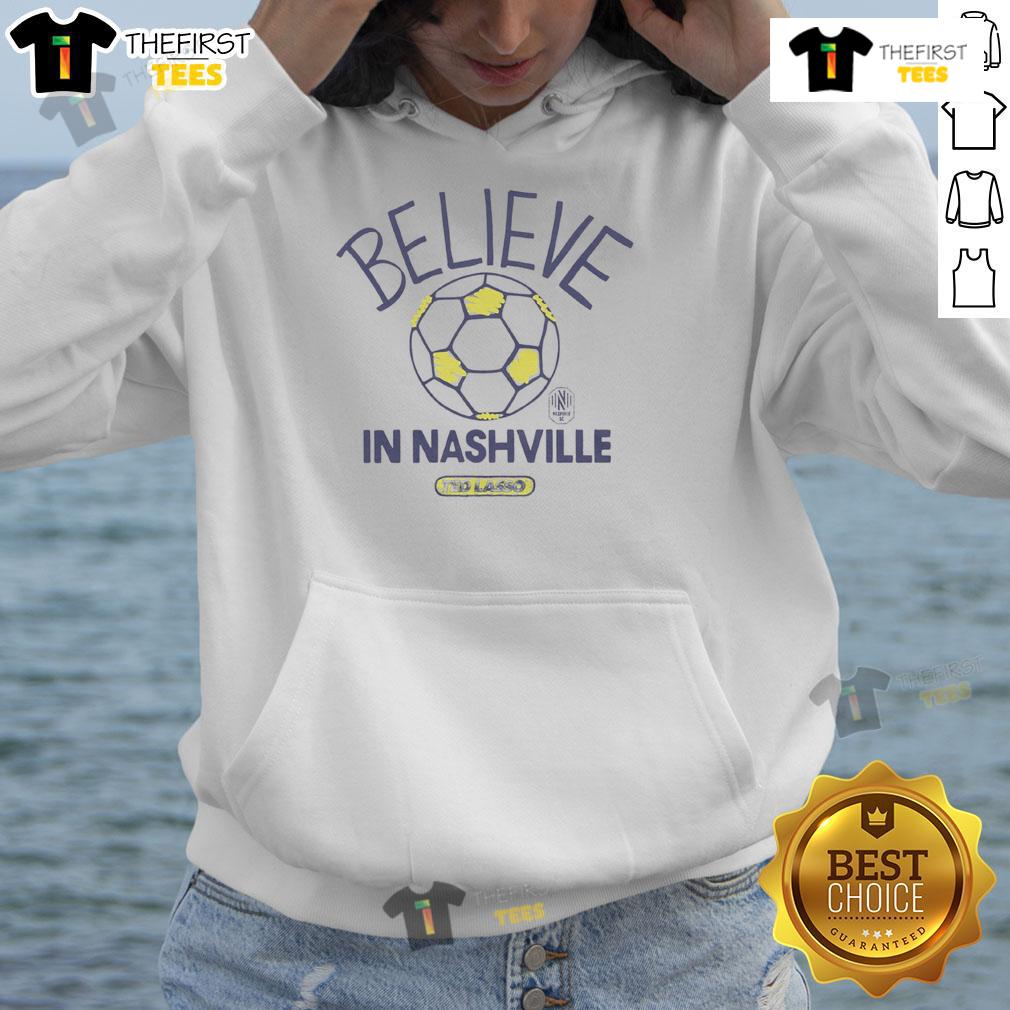Good Nashville Sc Homage Mls X Ted Lasso Believe Hoodie Good Nashville SC Homage hoodie inspired by Ted Lasso, featuring 'Believe' slogan and vibrant team colors.