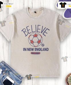 Good New England Revolution Homage MLS x Ted Lasso Believe washed t-shirt featuring iconic design and vibrant colors.