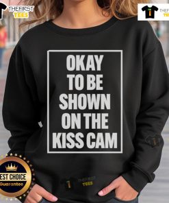 Good Okay To Be Shown On The Kiss Cam Sweatshirt featuring a playful graphic, perfect for sports events and casual outings.