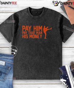Good Pay Him Pay That Man His Money washed t-shirt design featuring bold typography on a casual shirt.