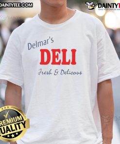 Good Peter Parker showcasing Delmar's Deli fresh and delicious t-shirt in a vibrant urban setting.