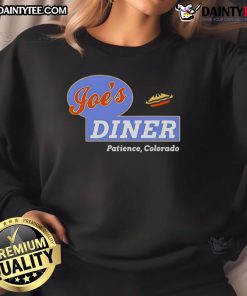 Good Resident Alien Joe's Diner sweatshirt featuring a colorful alien graphic, perfect for fans of the show and cozy wear.