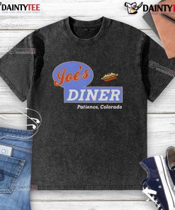Alt Text: Good Resident Alien Joe's Diner washed t-shirt featuring a vibrant graphic and soft fabric, perfect for casual wear.