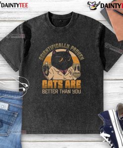 Good scientifically proven cats are better than you washed t-shirt in a casual setting with a playful cat.