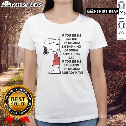 Good Snoopy tee for ladies featuring a playful quote about mischief and smiling, perfect for casual wear.