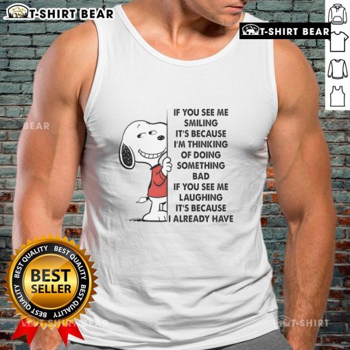 Good Snoopy tank top featuring the phrase 'If you see me smiling, it's because I'm thinking of doing something bad.'