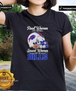 Good Snoopy t-shirt design for women featuring 'Real Women Love Football, Smart Women Love the Buffalo Bills' slogan.