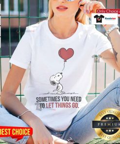 Good Snoopy Sometimes You Need to Let Things Go Ladies Tee featuring Snoopy and a motivational quote on a stylish shirt.