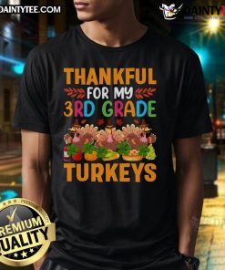 Alt Text: Child wearing a 'Good Thankful For My 3rd Grade Turkeys Thanksgiving T-Shirt' with colorful turkey graphic.