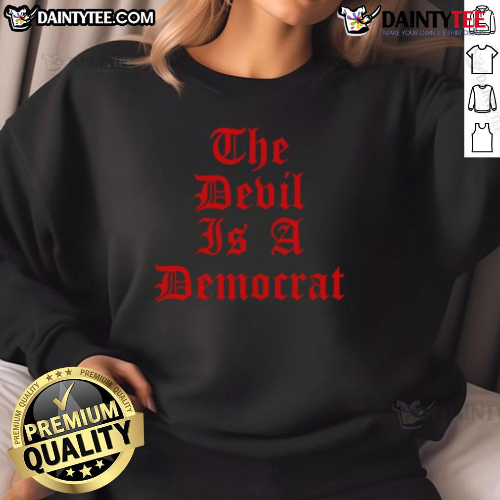 Good The Devil Is A Democrat Sweatshirt Good The Devil Is A Democrat Sweatshirt featuring bold graphic text on a cozy, stylish fabric in a casual setting.