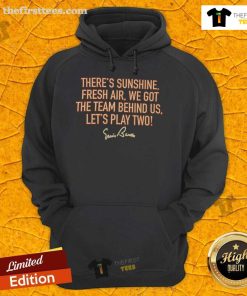Team in 'Good Theres Sunshine Fresh Air We Got The Team Behind Us Lets Play Two' hoodie enjoying outdoor fun.
