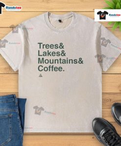 Good Trees Lakes Mountains and Coffee washed t-shirt displayed against a scenic outdoor backdrop, perfect for nature lovers.