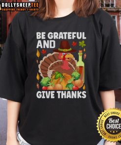 Alt Text: Good Turkey Wine Be Grateful and Give Thanks Thanksgiving Ladies Tee design featuring festive graphics and text.