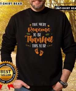 Cozy Thanksgiving sweatshirt with 'Two More Reasons to Be Thankful' design, perfect for celebrating the holiday season.