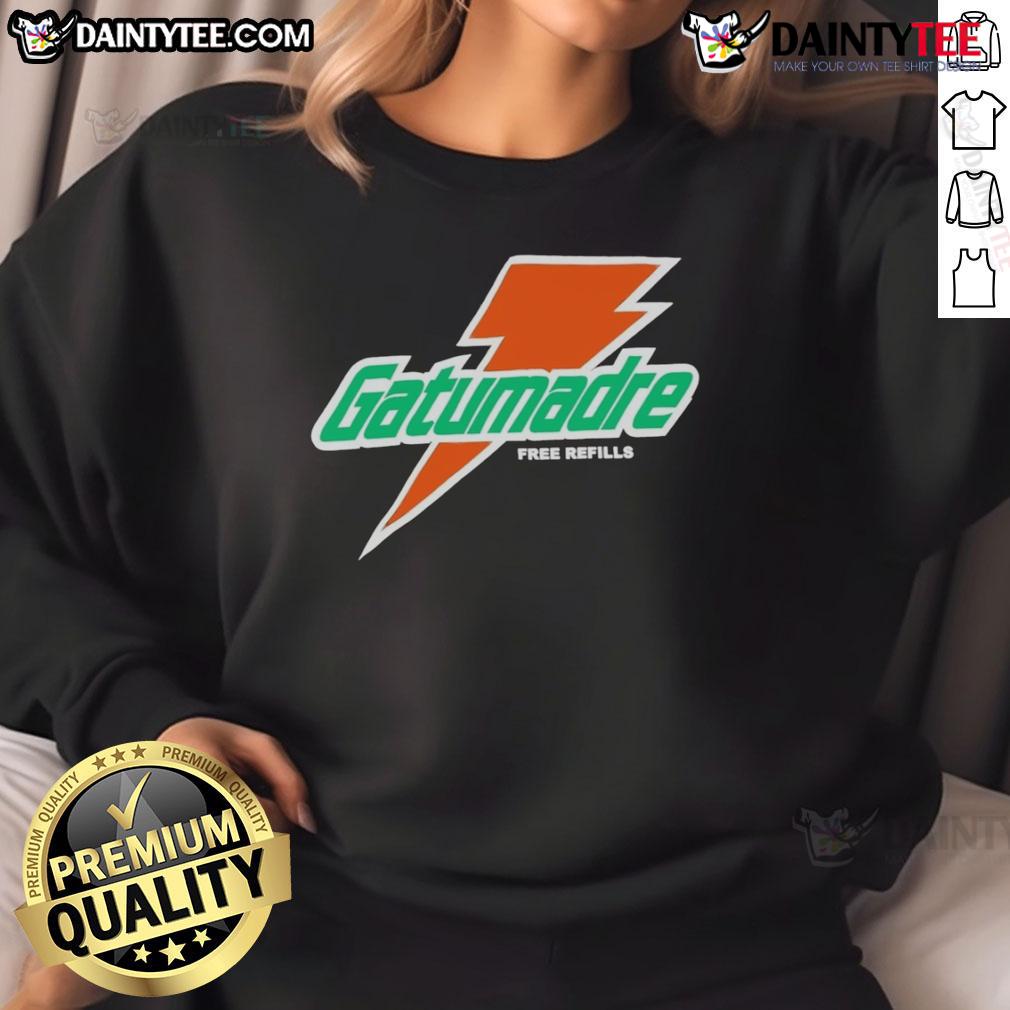 Good Will Kelly Wearing Orange Peel Gatorade Free Refills Logo Sweatshirt Good Will Kelly wearing an orange peel Gatorade sweatshirt with free refills logo, showcasing a vibrant and trendy style.