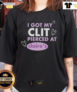 Happy woman wears 'I Got My Clit Pierced' tee from Claries, celebrating her body positivity and unique style.