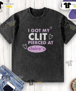 Happy person wearing a 'I Got My Clit Pierced at Claries' washed t-shirt, celebrating their new piercing in a joyful setting.