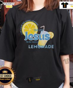 Happy Life Gave Me Some Lemons But My Jesus He Be Making Lemonade Ladies Tee, featuring a vibrant lemon graphic and uplifting text.