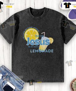 Alt Text: Happy Life Gave Me Some Lemons But My Jesus He Be Making Lemonade washed t-shirt displayed on a hanger.