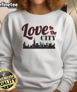 Cozy Happy Love in the City Skyline Sweatshirt featuring a vibrant cityscape design, perfect for urban fashion lovers.