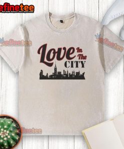 Happy Love in the City Skyline Washed T-Shirt featuring a vibrant city skyline design and a relaxed fit for casual style.